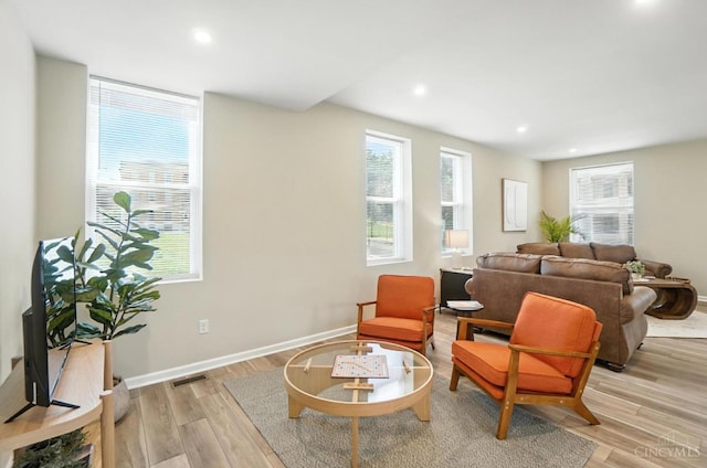 1582 Dixmont Ave, Cincinnati, OH 45207 - living room with light wood-type flooring and recessed lighting