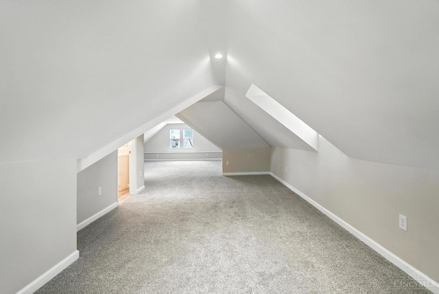 1582 Dixmont Ave, Cincinnati, OH 45207 - additional living space with vaulted ceiling and carpet flooring