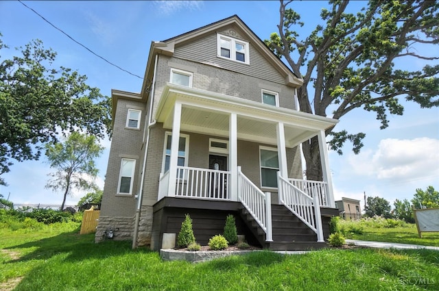 1582 Dixmont Ave, Cincinnati, OH 45207 - traditional style home with brick siding, a porch, and stairway