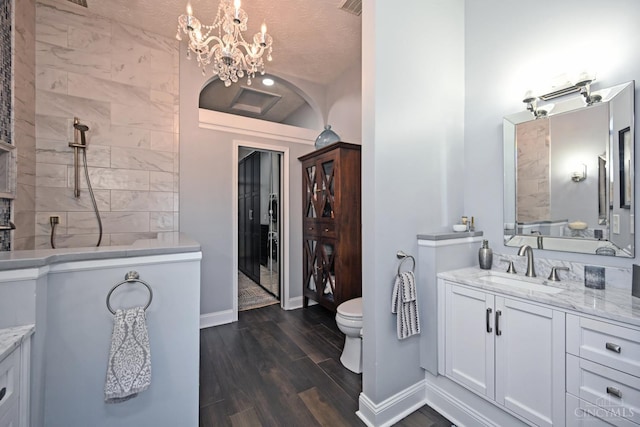 4154 Fieldsedge Dr, Mason, OH 45040 - bathroom with vanity, wood finished floors, a chandelier, and a walk in shower
