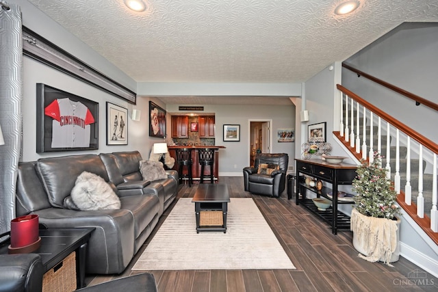 4154 Fieldsedge Dr, Mason, OH 45040 - living room featuring dark wood-style flooring, recessed lighting, stairway, and a textured ceiling