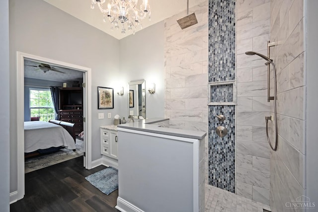 4154 Fieldsedge Dr, Mason, OH 45040 - bathroom with vanity, wood finished floors, walk in shower, a chandelier, and ensuite bathroom