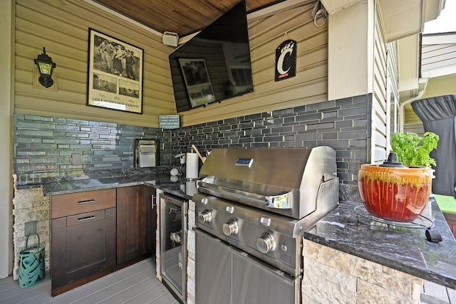 4154 Fieldsedge Dr, Mason, OH 45040 - kitchen featuring tasteful backsplash, wine cooler, dark stone countertops, and wooden ceiling
