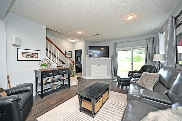 4154 Fieldsedge Dr, Mason, OH 45040 - living area with a textured ceiling, wood finished floors, stairs, and recessed lighting