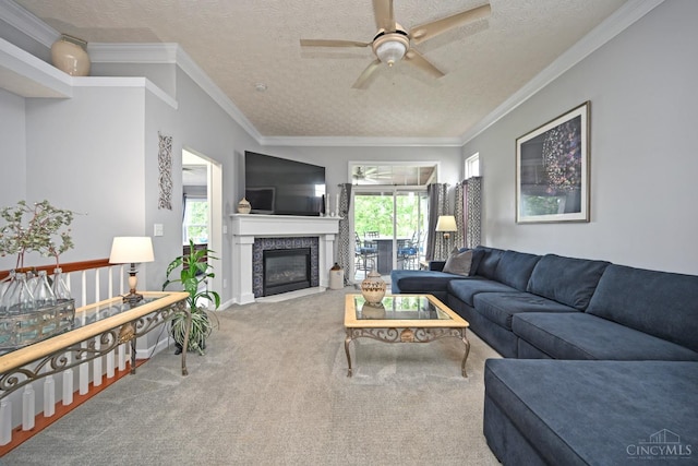 4154 Fieldsedge Dr, Mason, OH 45040 - living area featuring carpet, a ceiling fan, a textured ceiling, a fireplace with flush hearth, and crown molding