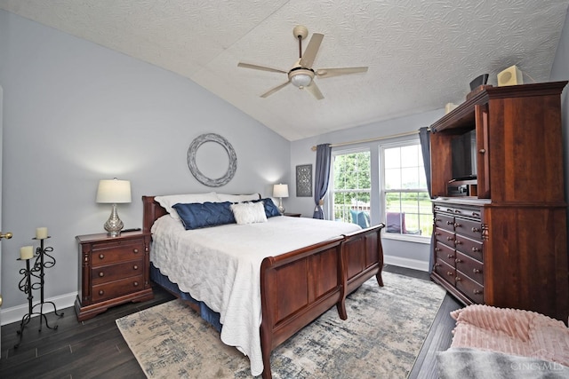 4154 Fieldsedge Dr, Mason, OH 45040 - bedroom with lofted ceiling, dark wood-style floors, a textured ceiling, and a ceiling fan