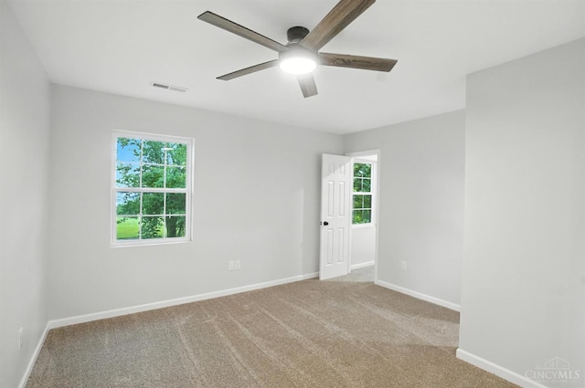 152 N College St, Sabina, OH 45169 - unfurnished room with ceiling fan and carpet