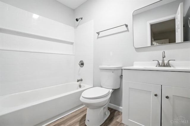 152 N College St, Sabina, OH 45169 - full bath featuring wood finished floors, vanity, and  shower combination