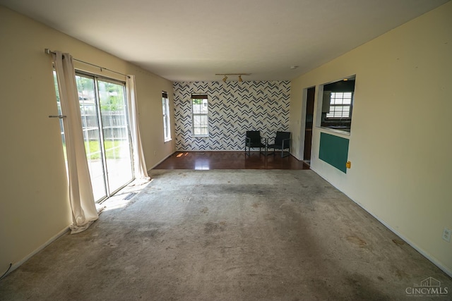 881 Trails End Dr, Liberty Twp, OH 45050 - unfurnished living room with healthy amount of natural light and carpet flooring