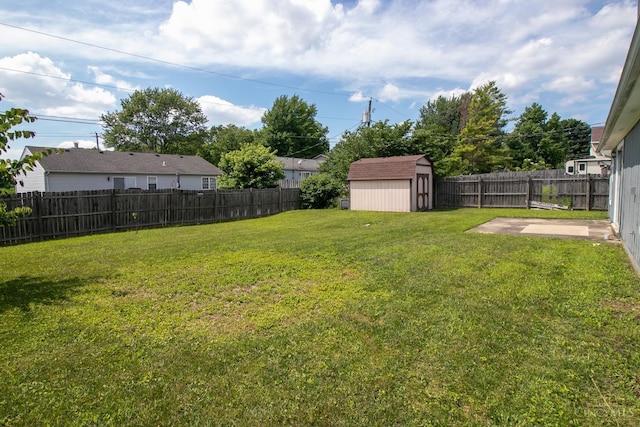 881 Trails End Dr, Liberty Twp, OH 45050 - fenced backyard with a shed and a patio area