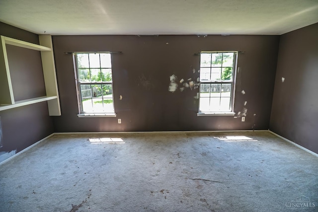 881 Trails End Dr, Liberty Twp, OH 45050 - unfurnished room with healthy amount of natural light and carpet floors