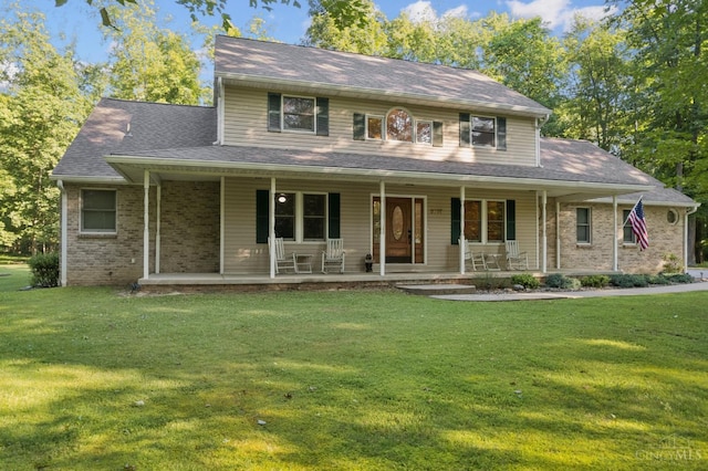 3067 Sugartree Rd, Tate Twp, OH 45106 - view of front of home with a front lawn, covered porch, and brick siding