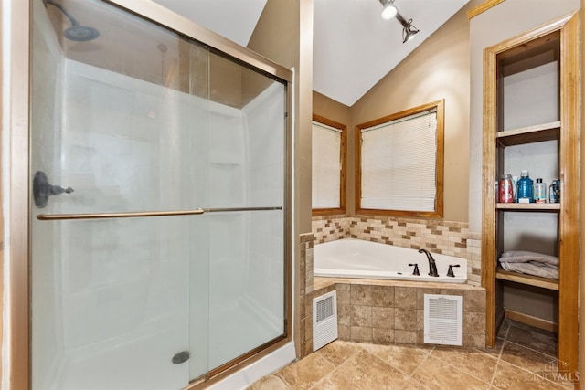 3067 Sugartree Rd, Tate Twp, OH 45106 - bathroom with a bath, a stall shower, and lofted ceiling