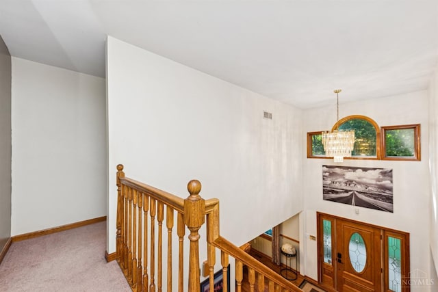 3067 Sugartree Rd, Tate Twp, OH 45106 - entryway featuring carpet flooring and a chandelier