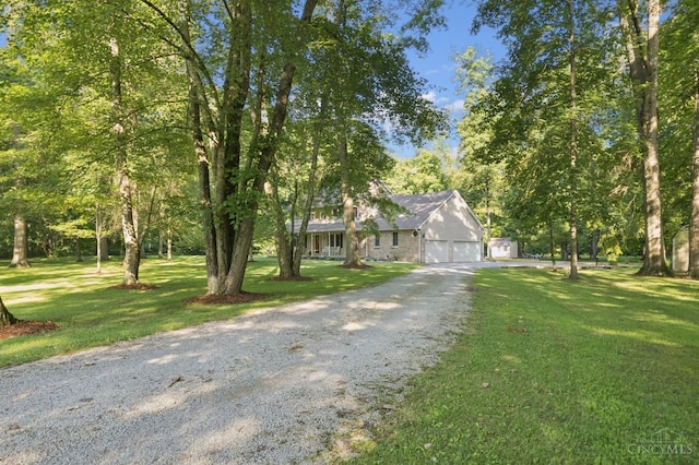 3067 Sugartree Rd, Tate Twp, OH 45106 - view of front of house featuring driveway, a front yard, a garage, and brick siding