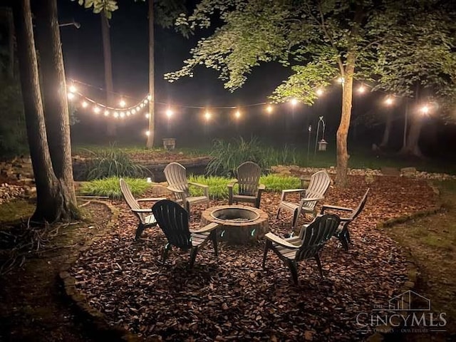 3067 Sugartree Rd, Tate Twp, OH 45106 - yard at twilight featuring a fire pit