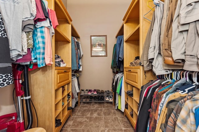 3067 Sugartree Rd, Tate Twp, OH 45106 - walk in closet featuring dark tile patterned floors