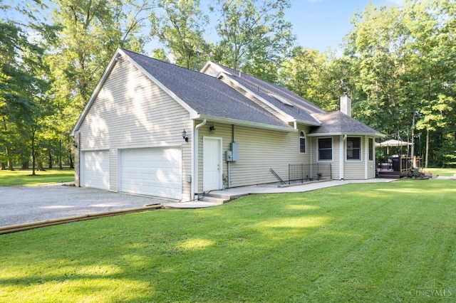 3067 Sugartree Rd, Tate Twp, OH 45106 - view of front facade featuring asphalt driveway, a garage, a chimney, a front yard, and roof with shingles
