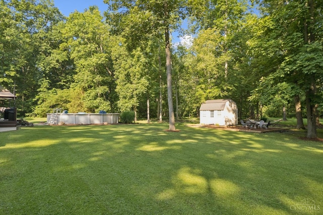 3067 Sugartree Rd, Tate Twp, OH 45106 - view of grassy yard featuring a storage shed and a covered pool
