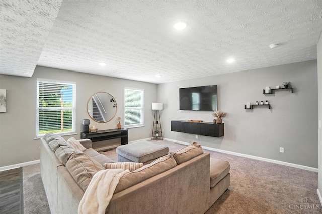 2821 Pine Leaf Ct, Hamilton, OH 45013 - living area featuring a textured ceiling, carpet, and recessed lighting