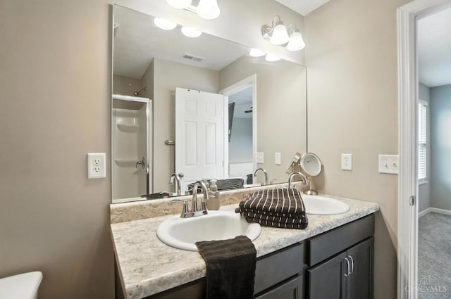 2821 Pine Leaf Ct, Hamilton, OH 45013 - bathroom with double vanity and a shower with shower door
