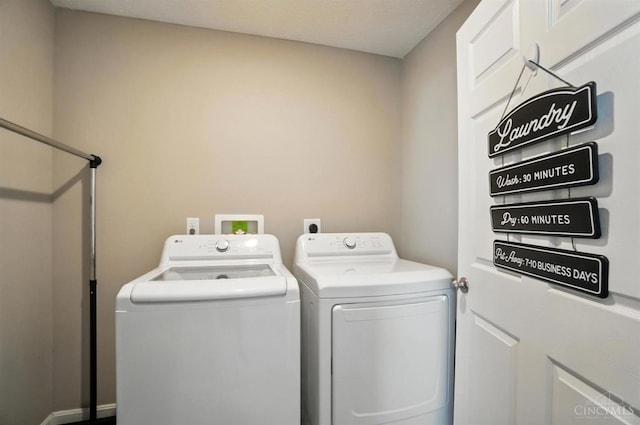 2821 Pine Leaf Ct, Hamilton, OH 45013 - laundry room featuring separate washer and dryer