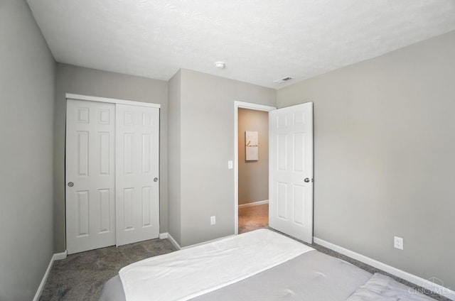 2821 Pine Leaf Ct, Hamilton, OH 45013 - bedroom featuring a closet and carpet floors