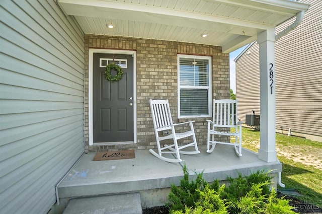 2821 Pine Leaf Ct, Hamilton, OH 45013 - property entrance with a porch and stone siding