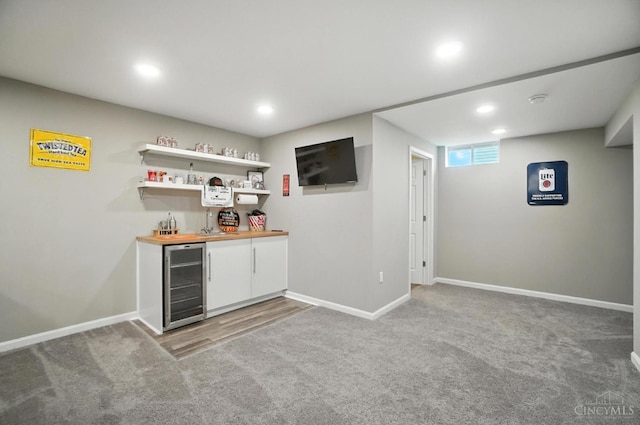 2821 Pine Leaf Ct, Hamilton, OH 45013 - indoor wet bar featuring wine cooler, carpet, and recessed lighting