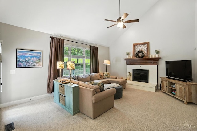 7070 Ravens Run, Anderson Twp, OH 45244 - living room with light colored carpet, a ceiling fan, a fireplace, and high vaulted ceiling