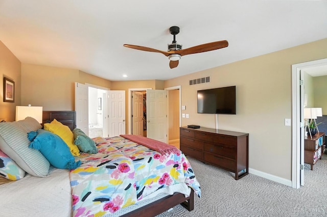 7070 Ravens Run, Anderson Twp, OH 45244 - bedroom featuring light carpet, ensuite bathroom, and a ceiling fan