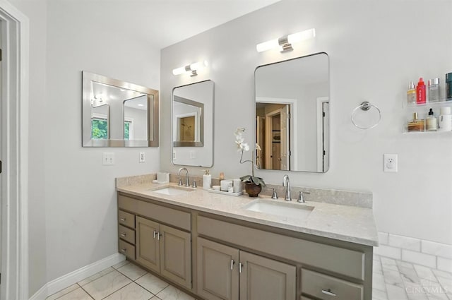 7070 Ravens Run, Anderson Twp, OH 45244 - bathroom featuring double vanity and marble finish flooring
