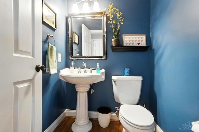 7070 Ravens Run, Anderson Twp, OH 45244 - half bath with wood finished floors and toilet