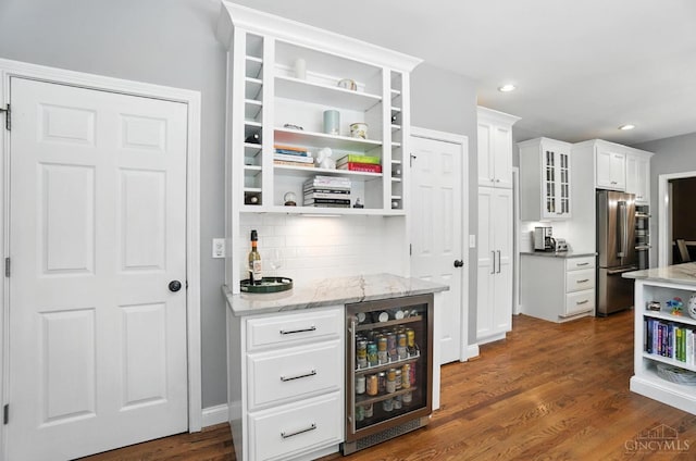 7070 Ravens Run, Anderson Twp, OH 45244 - indoor dry bar with freestanding refrigerator, dark wood-style floors, decorative backsplash, recessed lighting, and wine cooler