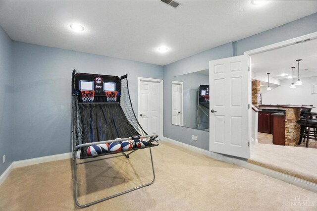 7070 Ravens Run, Anderson Twp, OH 45244 - recreation room featuring light carpet and recessed lighting