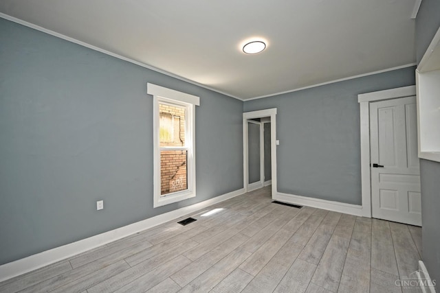 26 Boltin St, Dayton, OH 45403 - unfurnished room featuring wood finished floors and crown molding