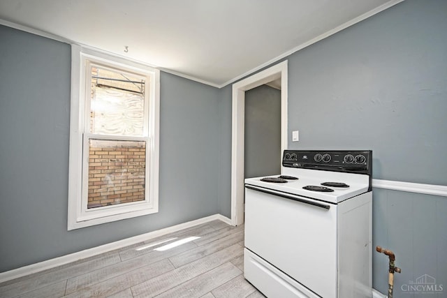 26 Boltin St, Dayton, OH 45403 - kitchen featuring electric stove, light wood-style flooring, and white cabinetry