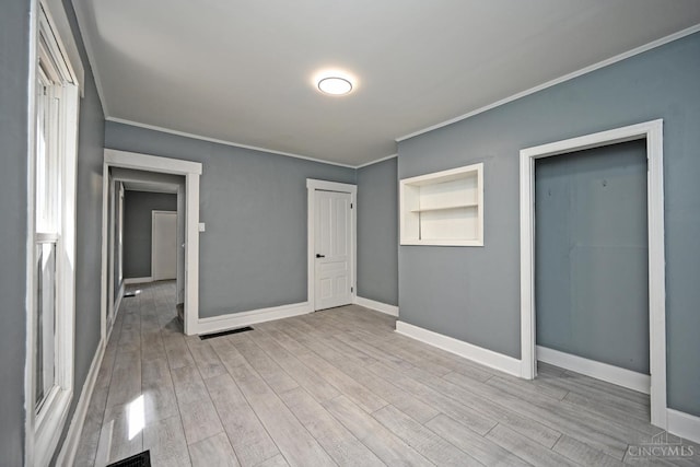 26 Boltin St, Dayton, OH 45403 - unfurnished bedroom with ornamental molding and wood finished floors