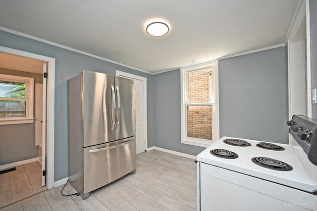 26 Boltin St, Dayton, OH 45403 - kitchen featuring electric stove, freestanding refrigerator, light wood-style floors, and crown molding