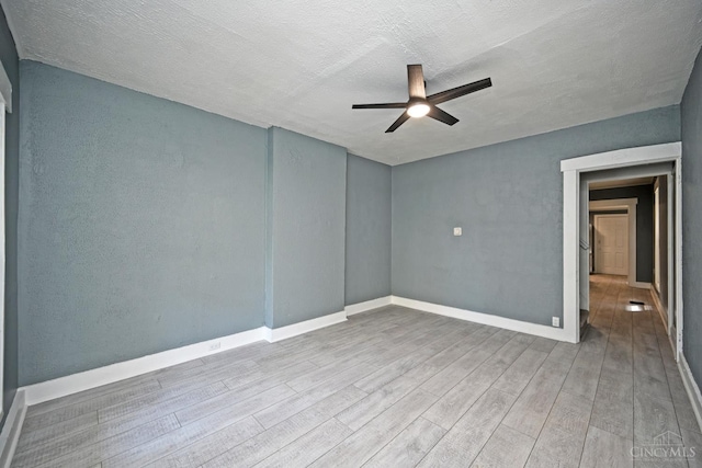 26 Boltin St, Dayton, OH 45403 - empty room featuring a ceiling fan, wood finished floors, and a textured ceiling