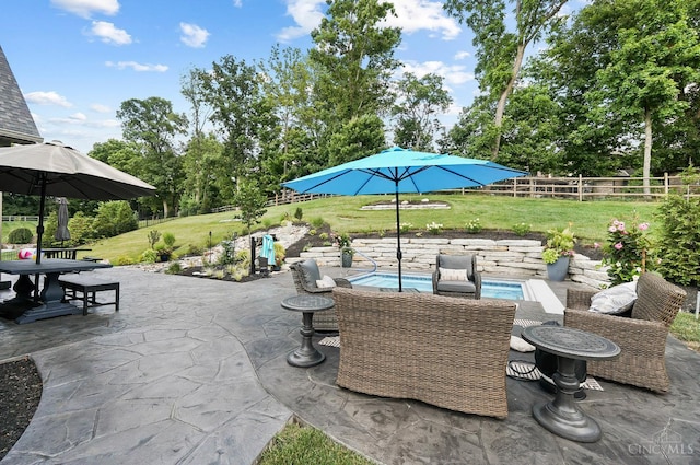 7574 Copper Creek Ln, Colerain Twp, OH 45247 - fenced backyard featuring a patio, view of wooded area, and outdoor dining space