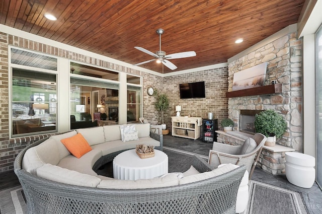 7574 Copper Creek Ln, Colerain Twp, OH 45247 - view of patio with an outdoor living space with a fireplace and ceiling fan