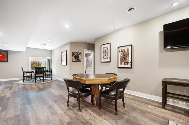 7574 Copper Creek Ln, Colerain Twp, OH 45247 - dining area with wood finished floors and recessed lighting