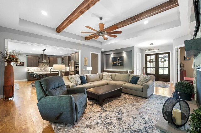 7574 Copper Creek Ln, Colerain Twp, OH 45247 - living room featuring light wood finished floors, ceiling fan, recessed lighting, and beamed ceiling