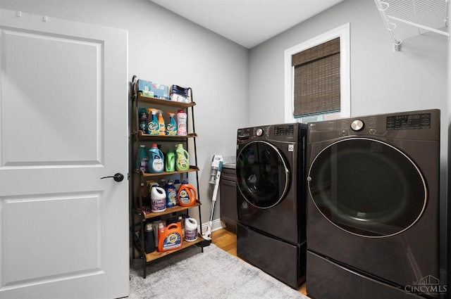 7574 Copper Creek Ln, Colerain Twp, OH 45247 - laundry area featuring separate washer and dryer and wood finished floors