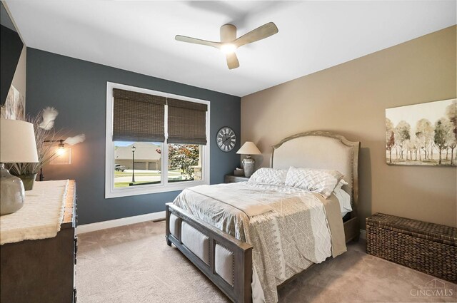 7574 Copper Creek Ln, Colerain Twp, OH 45247 - bedroom featuring light carpet and ceiling fan