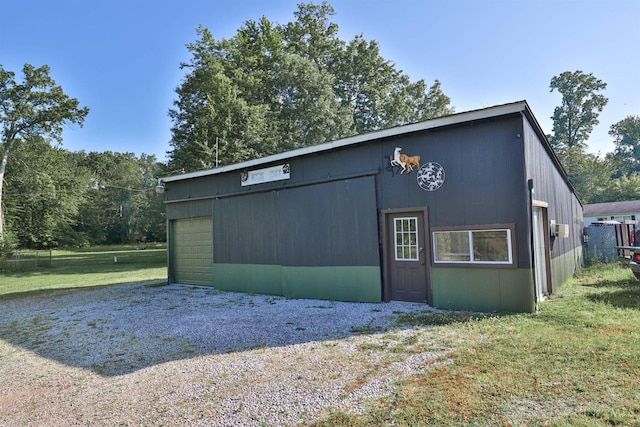 1851 Parker Rd, Goshen Twp, OH 45150 - view of home's exterior with driveway, a yard, an outdoor structure, and a detached garage