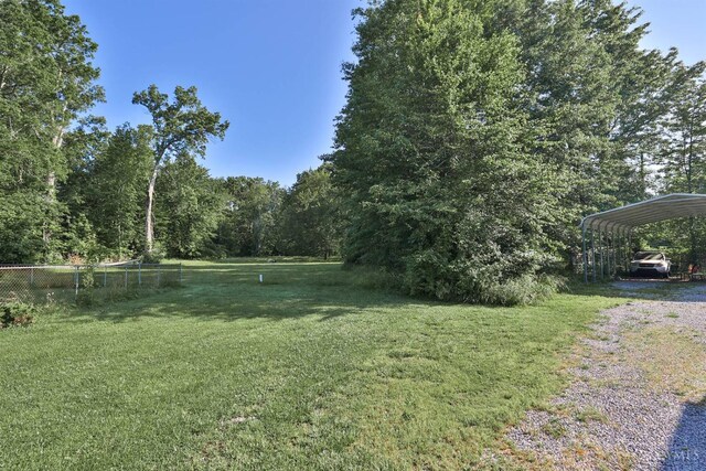 1851 Parker Rd, Goshen Twp, OH 45150 - view of yard with driveway and a carport