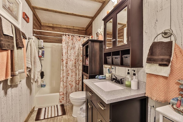 1851 Parker Rd, Goshen Twp, OH 45150 - full bathroom with vanity, shower / tub combo with curtain, wood finished floors, and a textured ceiling