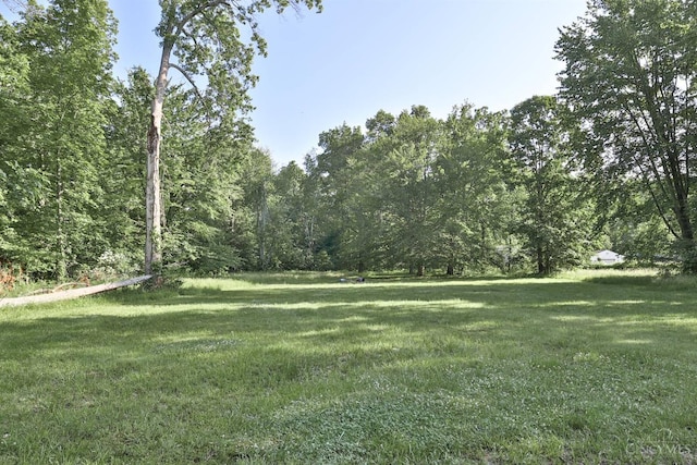 1851 Parker Rd, Goshen Twp, OH 45150 - view of grassy yard featuring a wooded view
